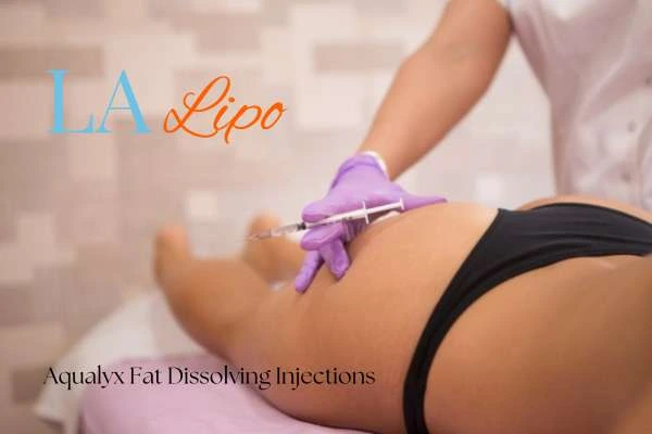 Woman having fat dissolving injections on thighs