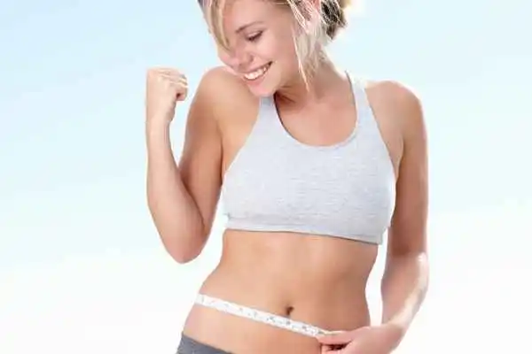 woman happy after fat reduction treatment