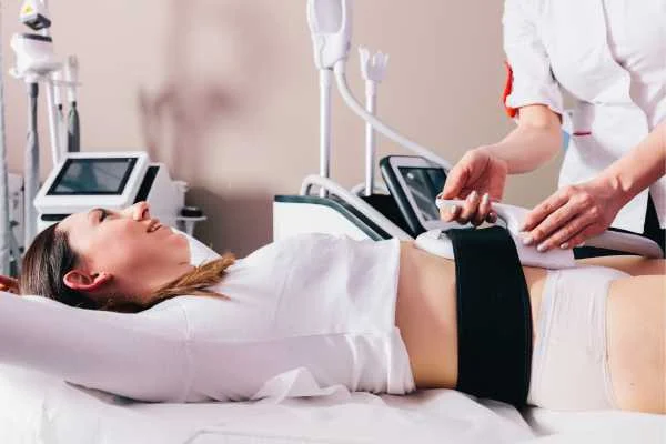 woman having body sculpting to help improve her body image and her mental health
